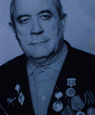 Таджиев Холик